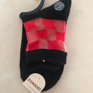 Black and red Zokke sock. New.
